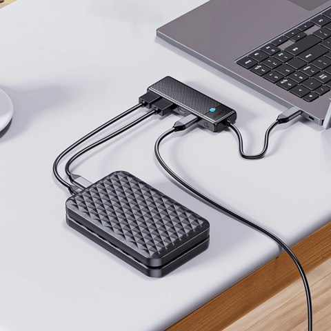 Hub USB-A Orico PAPW4A-C3 stacja dokująca 4x USB-A 3.0 - czarny Hub USB-A Orico PAPW4A-C3 stacja dokująca 4x USB-A 3.0 - czarny